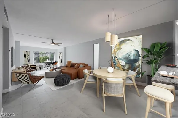 a dining room with furniture a chandelier and kitchen view