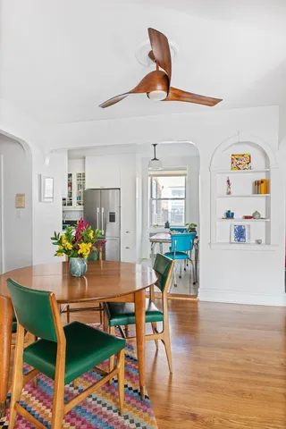 a workspace with furniture and wooden floor