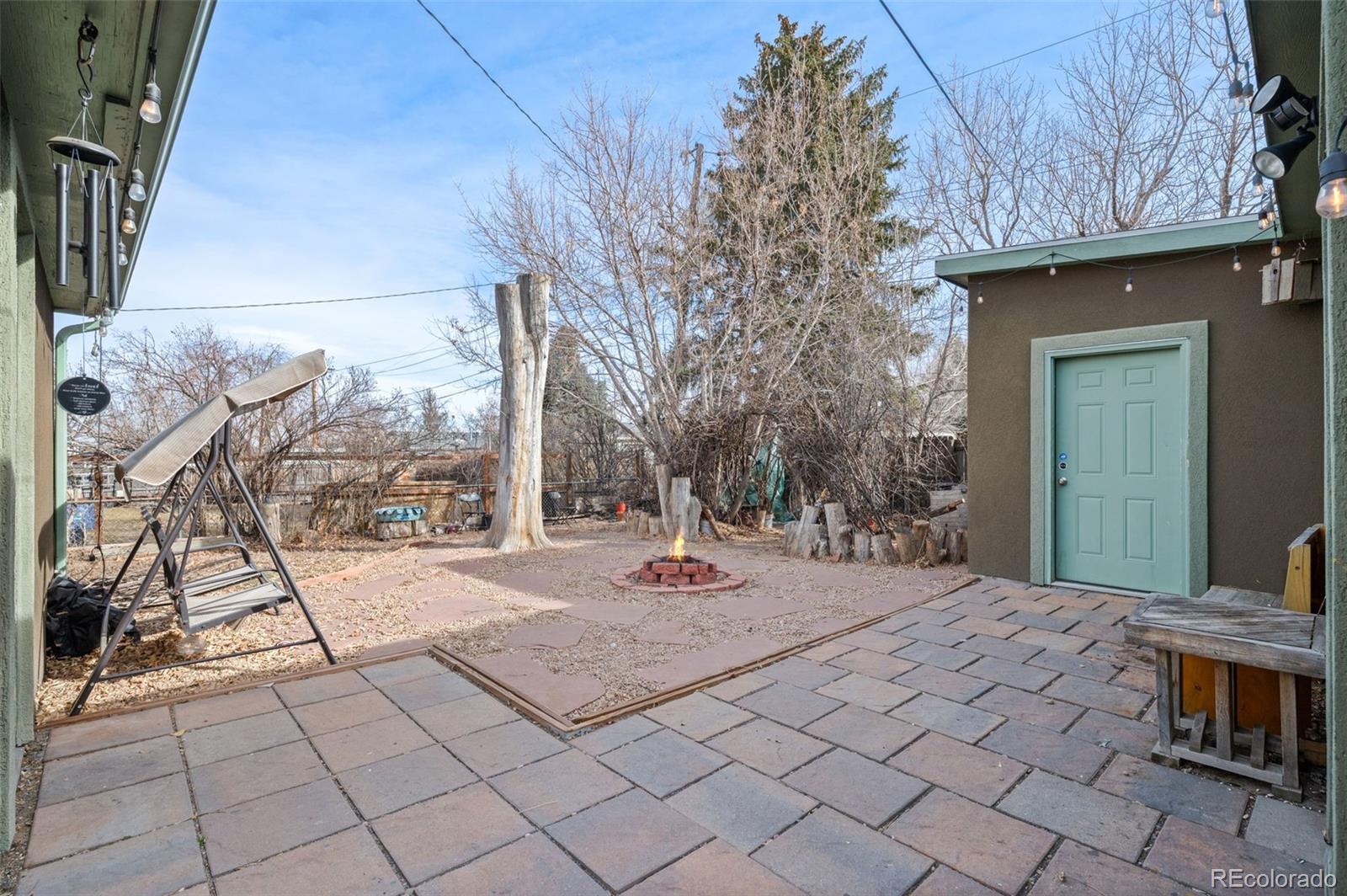 776 South Yates Street Denver, CO 80219 - Photo 30 of 34 a backyard of a house with seating space