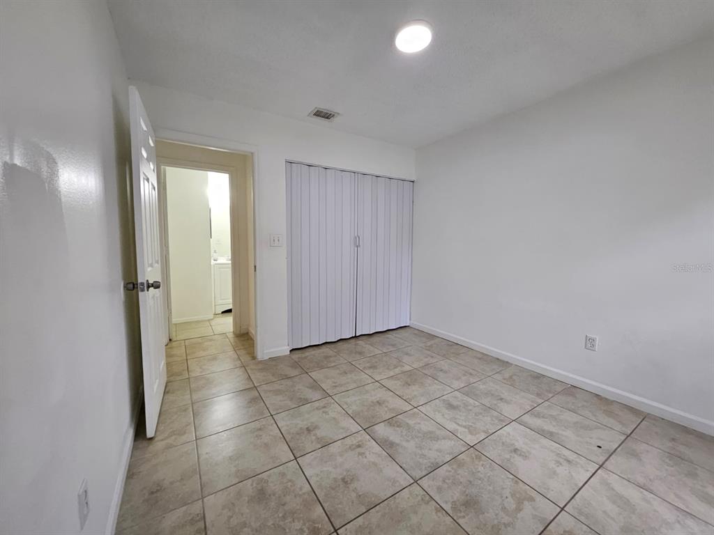 3651 North Goldenrod Road, Unit B#104 Winter Park, FL 32792 - Photo 13 of 21 a view of a hallway