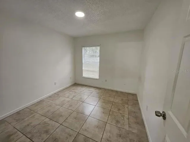 a bathroom with a toilet sink and shower