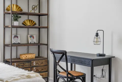 a bedroom with a bed and a closet