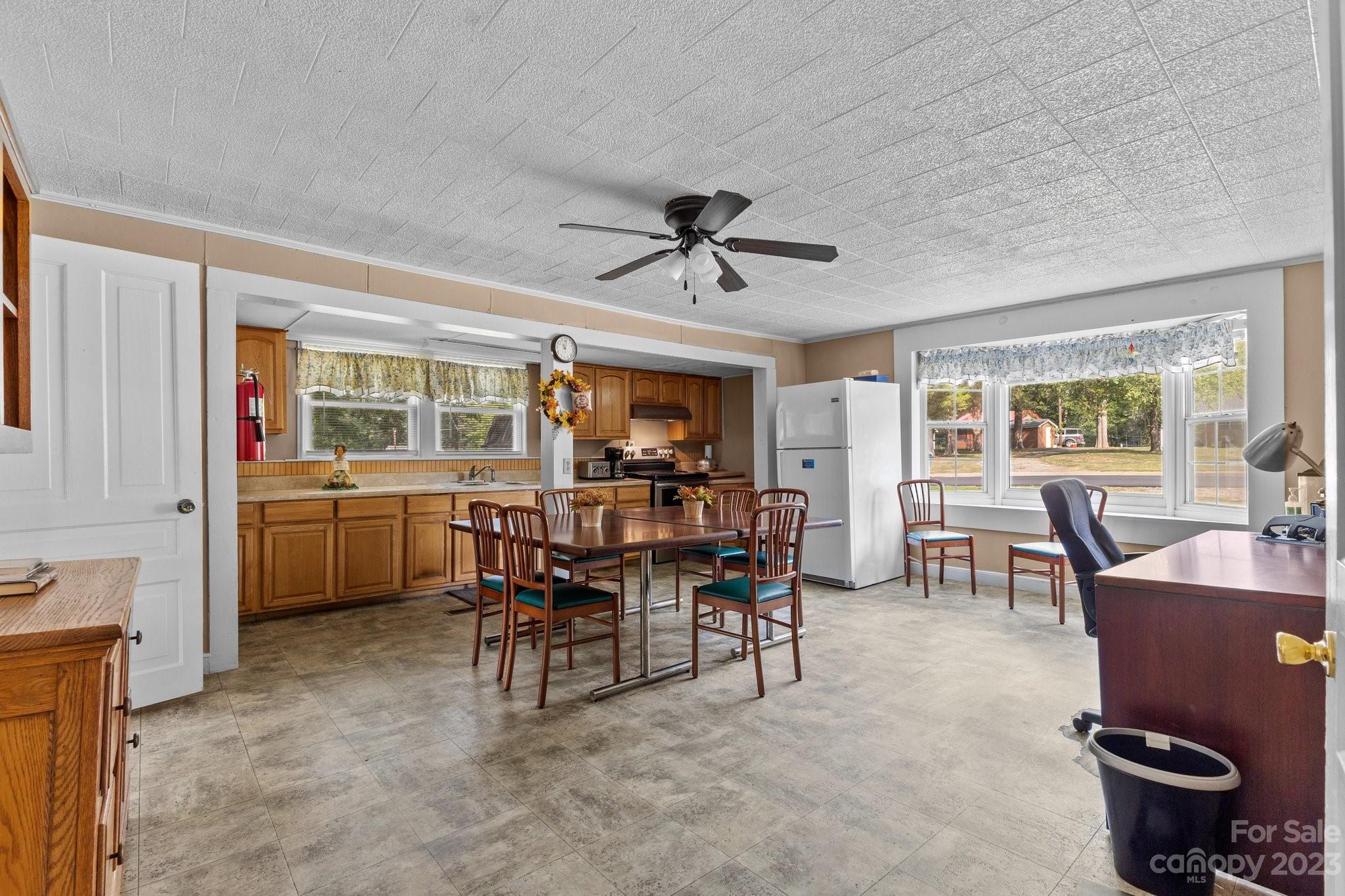 602 Aileen Avenue Biscoe, NC 27209 - Photo 15 of 27 a view of a dining room with furniture and window
