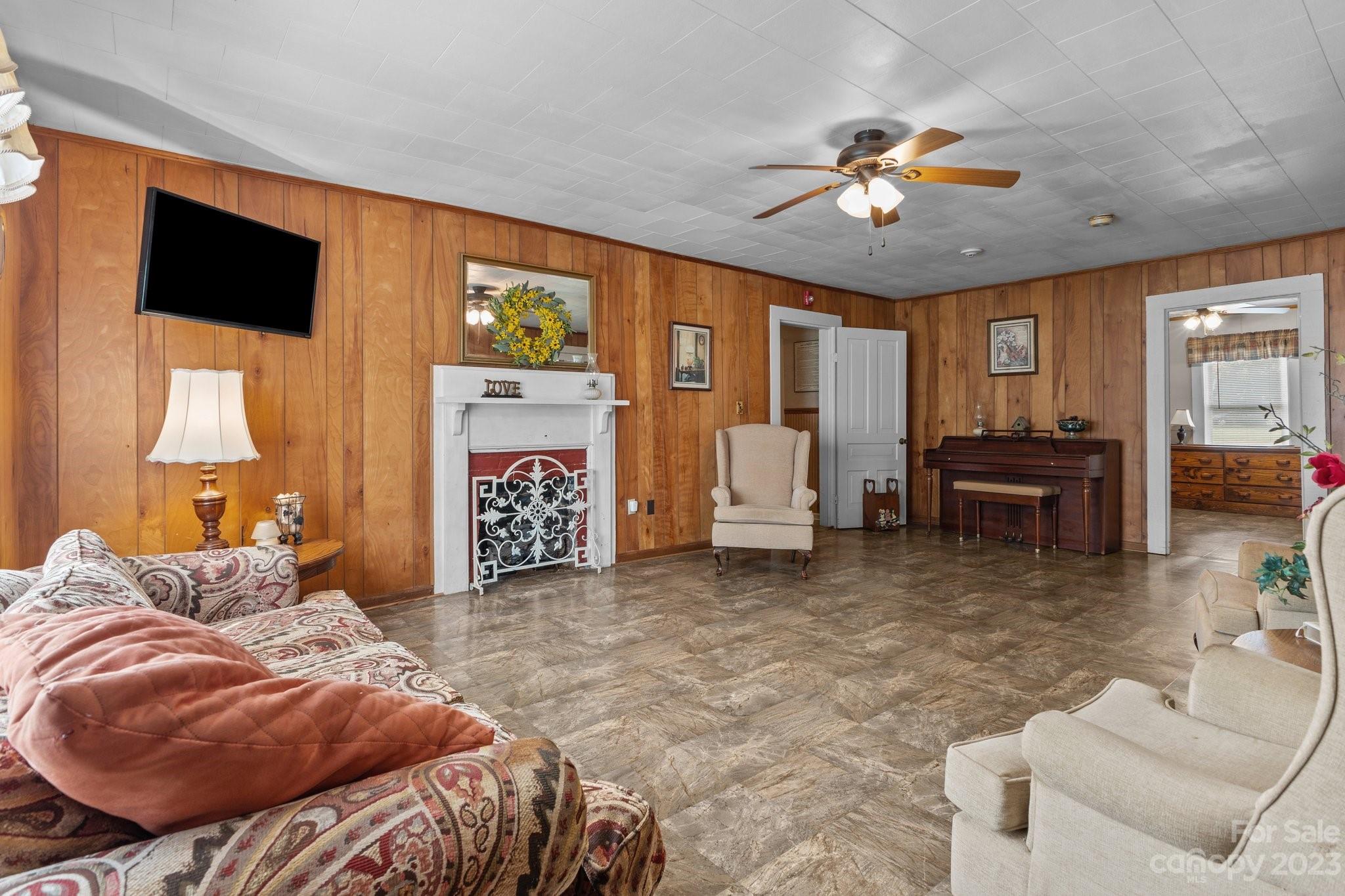602 Aileen Avenue Biscoe, NC 27209 - Photo 5 of 27 a living room with furniture and a flat screen tv