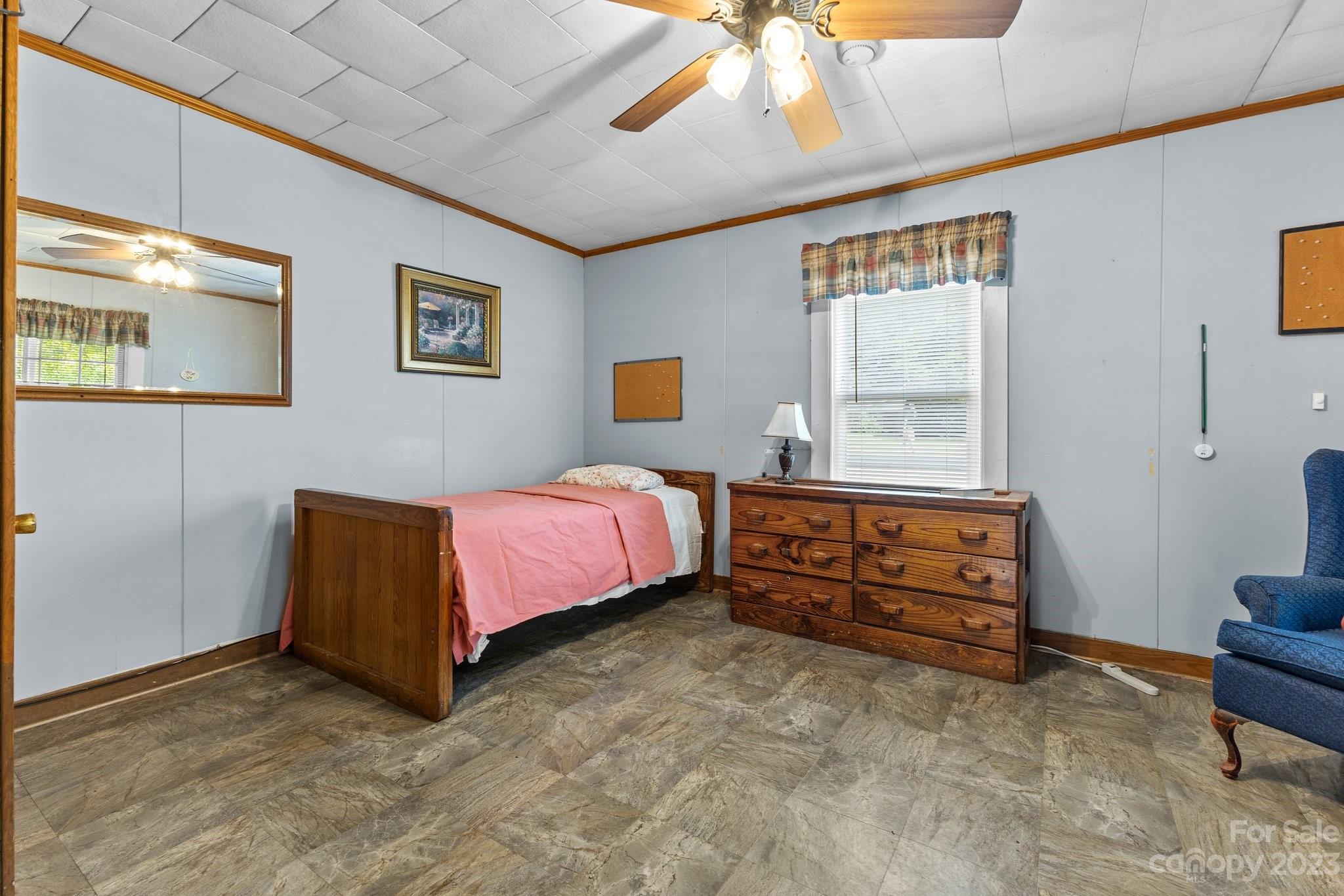 602 Aileen Avenue Biscoe, NC 27209 - Photo 6 of 27 a bedroom with a bed and a window