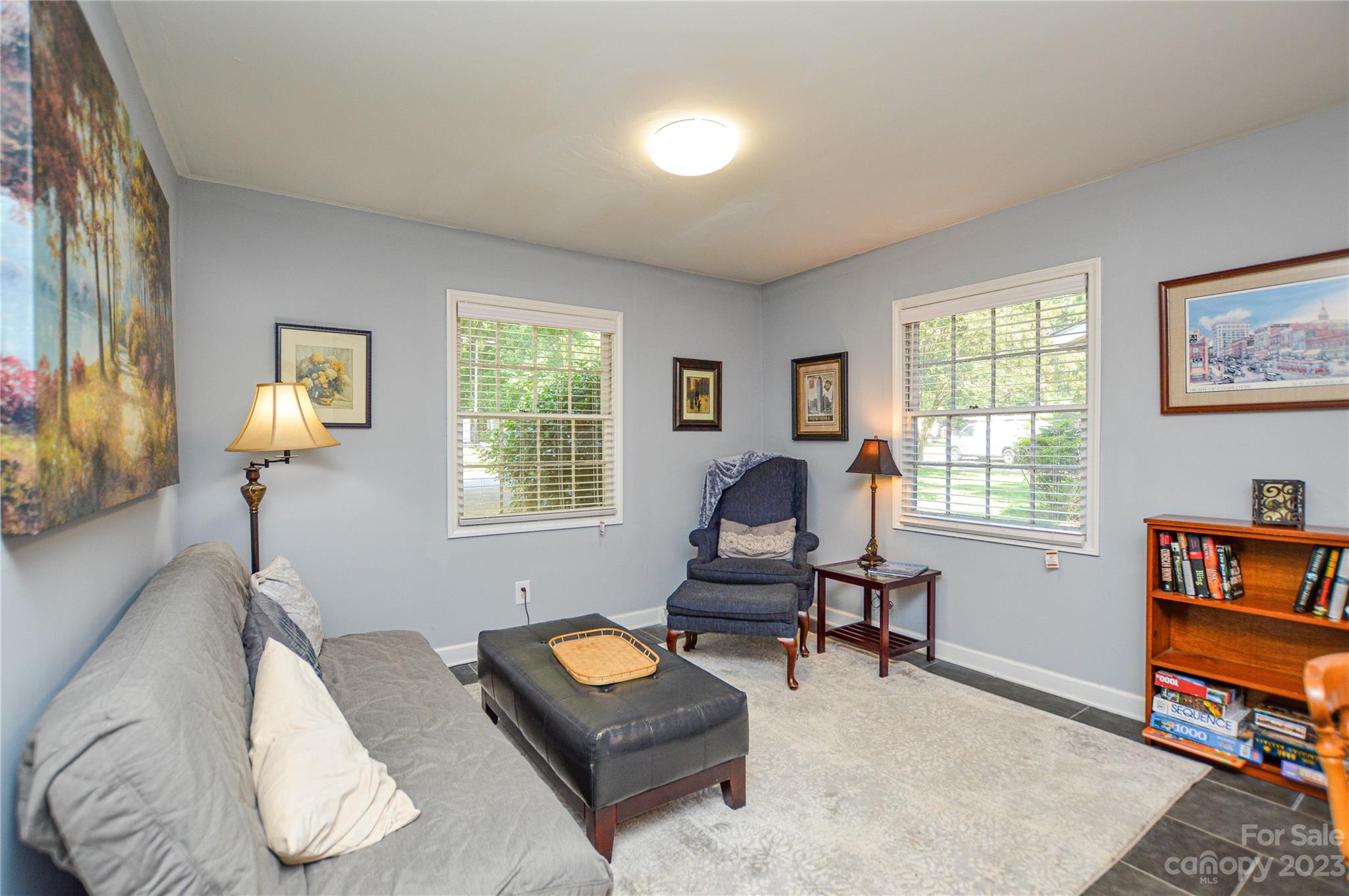 931 Tilden Road Charlotte, NC 28214 - Photo 12 of 33 a living room with furniture and a window