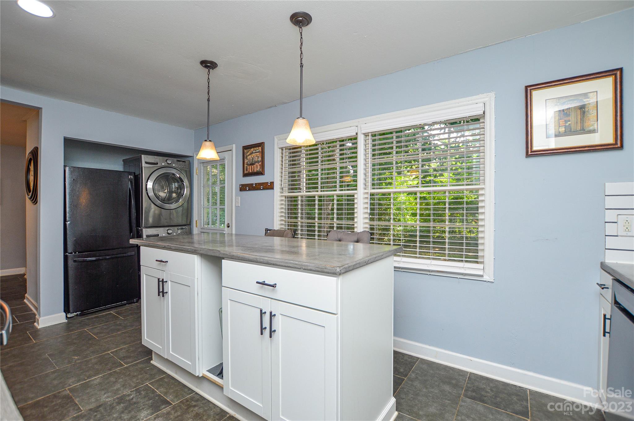 931 Tilden Road Charlotte, NC 28214 - Photo 15 of 33 a kitchen with stainless steel appliances granite countertop a refrigerator a sink and dishwasher