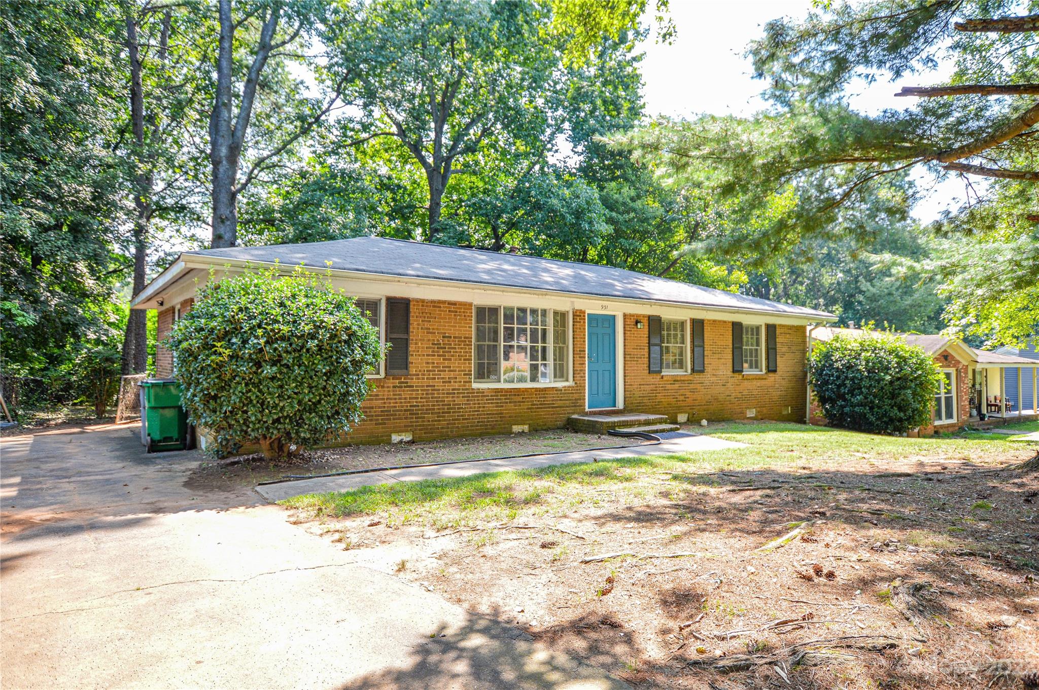 931 Tilden Road Charlotte, NC 28214 - Photo 2 of 33 a view of a house with a yard