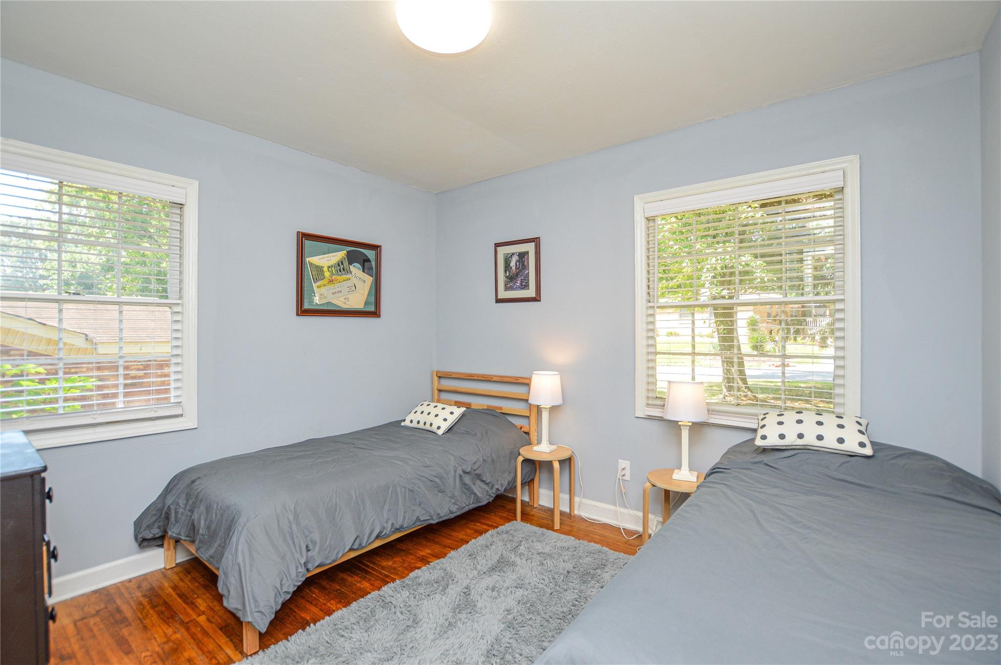 931 Tilden Road Charlotte, NC 28214 - Photo 21 of 33 a bedroom with a bed and next to a window