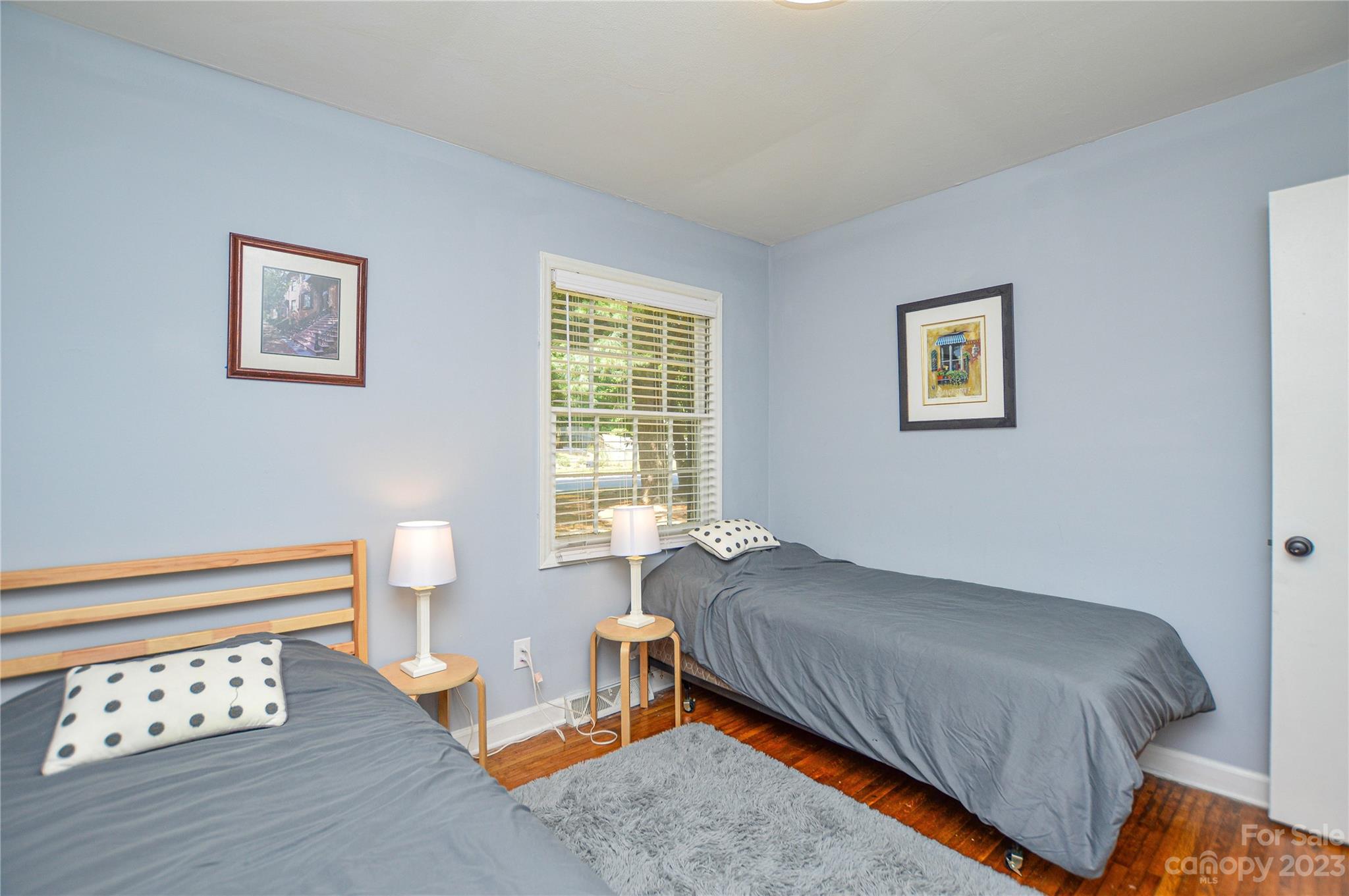 931 Tilden Road Charlotte, NC 28214 - Photo 22 of 33 a bedroom with a bed and a window
