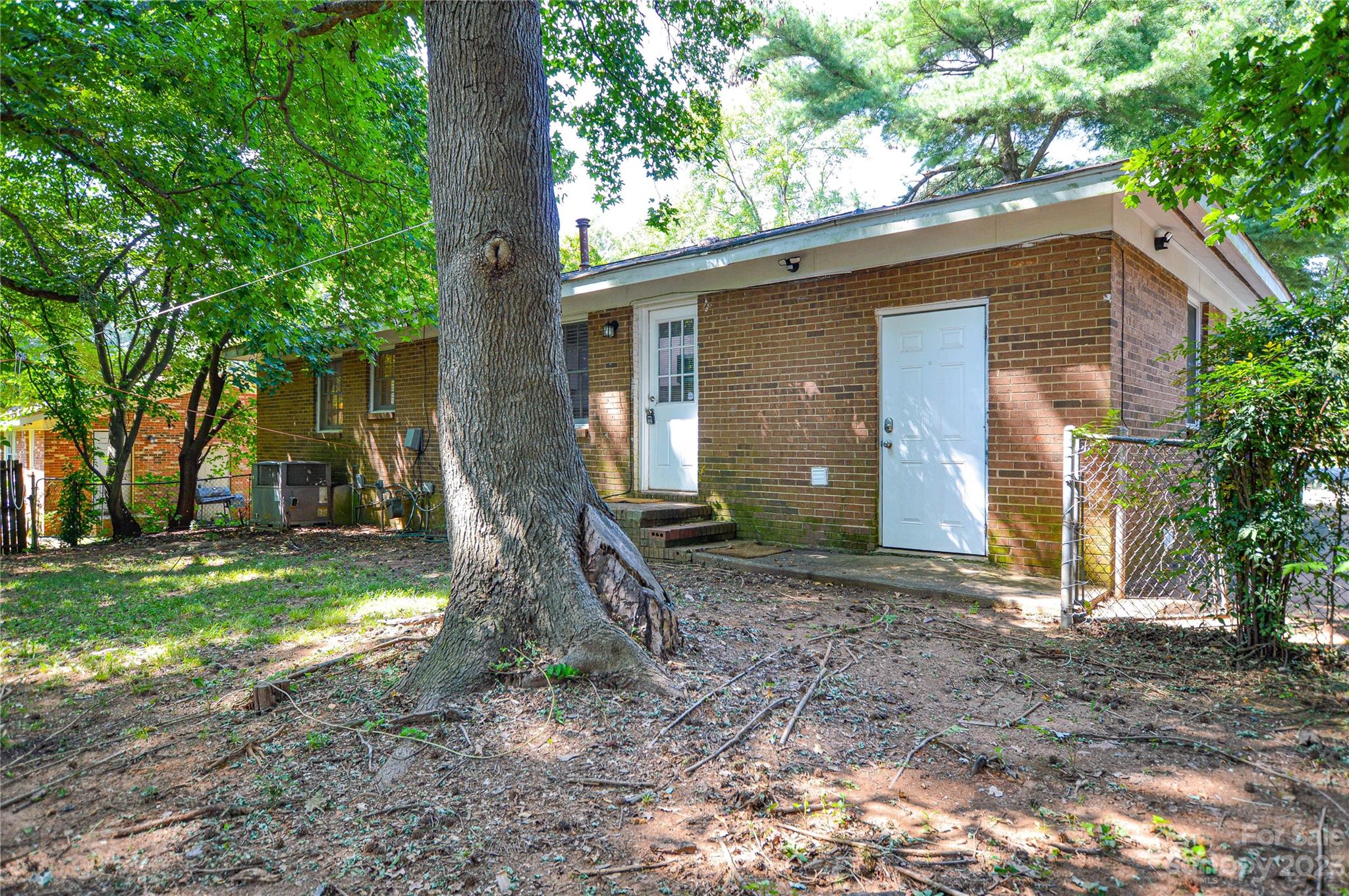 931 Tilden Road Charlotte, NC 28214 - Photo 32 of 33 a front view of a house with garden