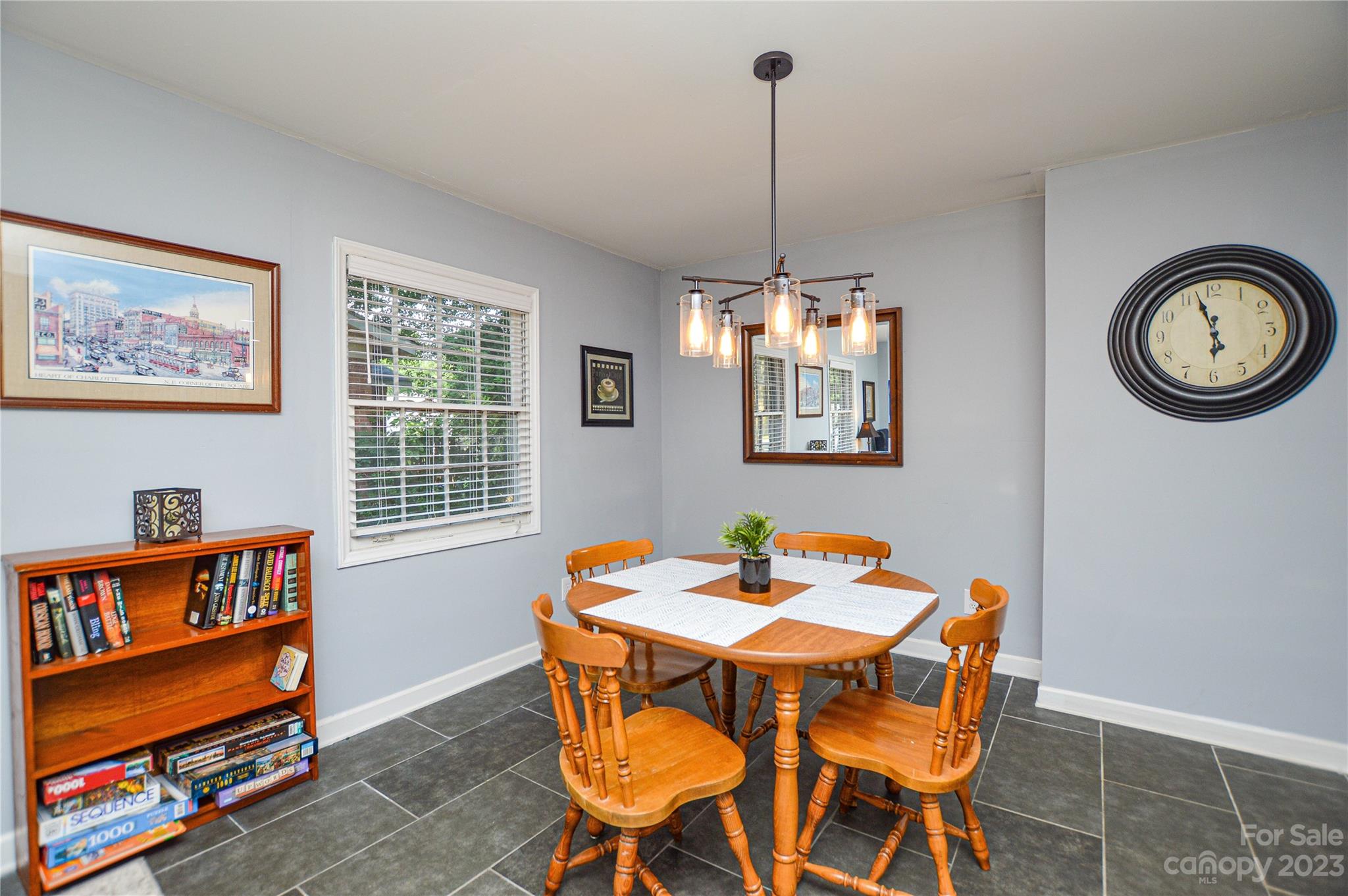 931 Tilden Road Charlotte, NC 28214 - Photo 9 of 33 a view of a dining room with furniture and a window