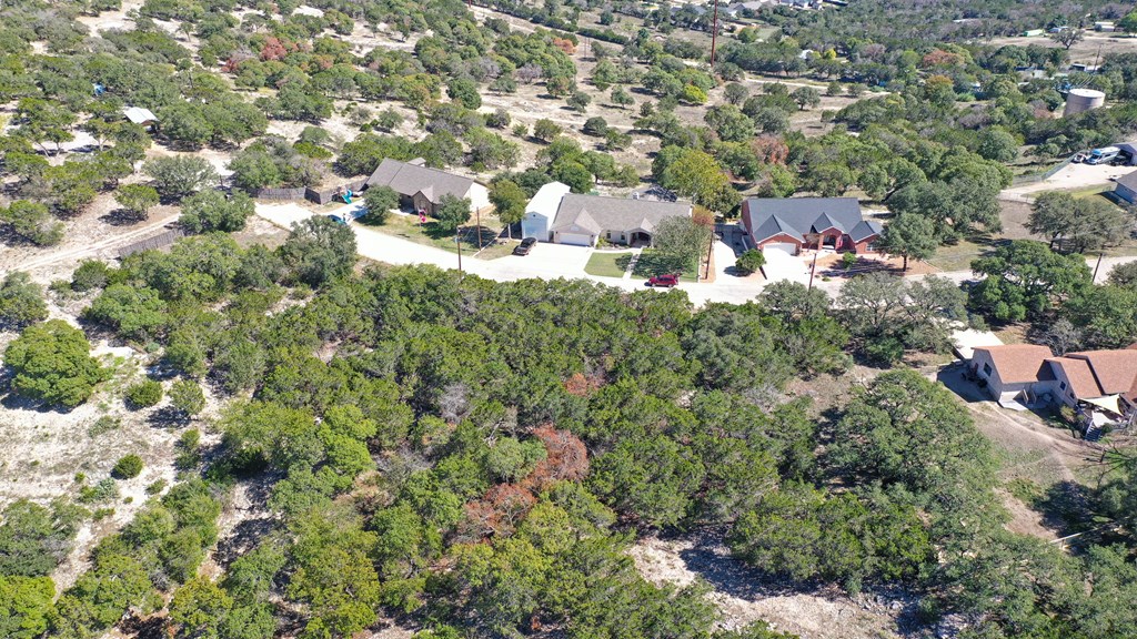 506 Sumack, Unit 11 Kerrville, TX 78028 - Photo 11 of 12 an aerial view of residential houses with outdoor space and trees
