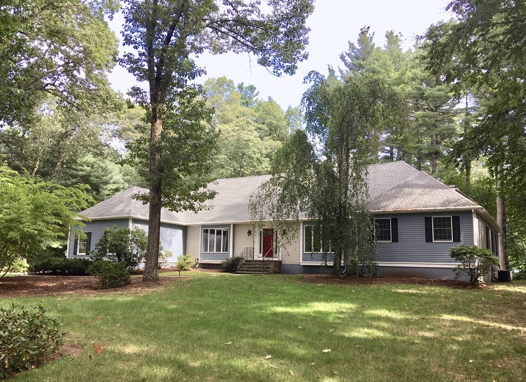 42 Phillips Road Sudbury, MA 01776 - Photo 1 of 28 a front view of a house with a garden