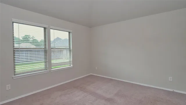 an empty room with a window