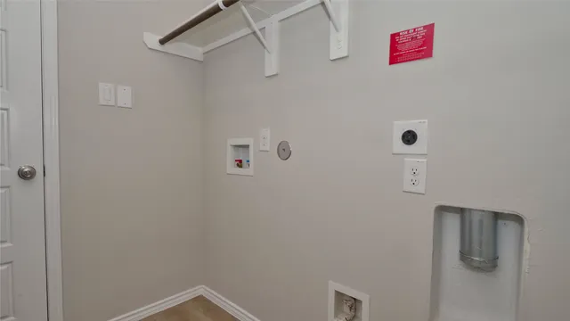 a bathroom with a shower and a shower head