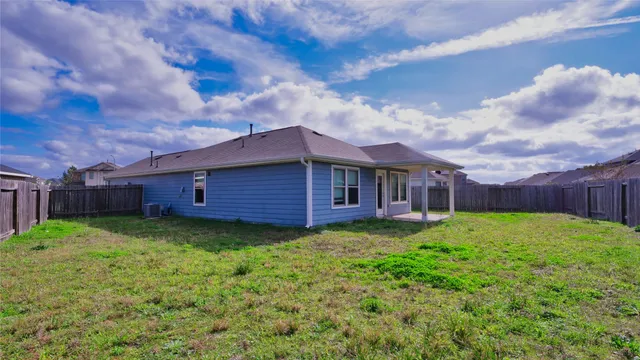 a fire hydrant in the middle of a field
