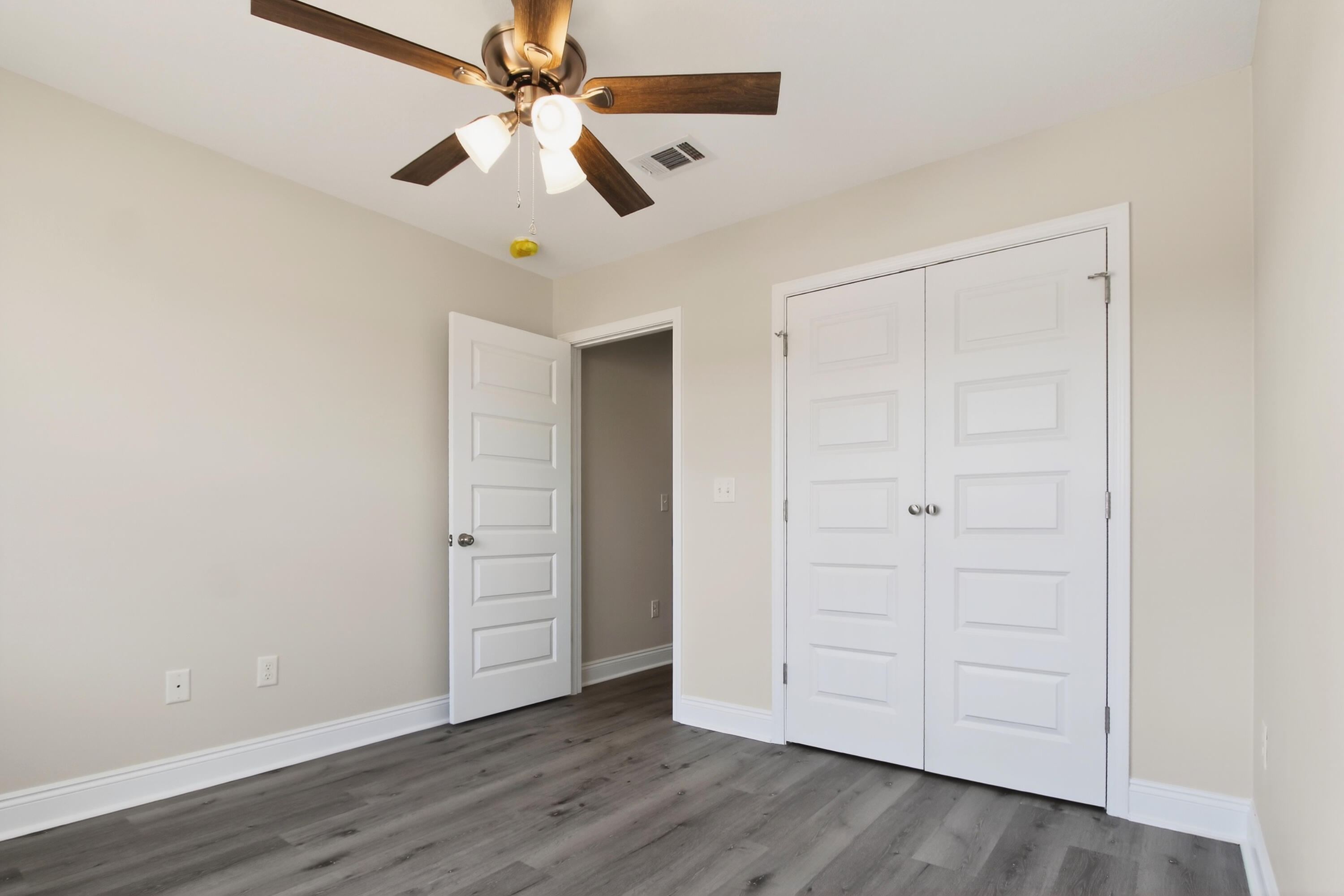 5358 Highview Drive Crestview, FL 32539 - Photo 15 of 31 wooden floor in an empty room