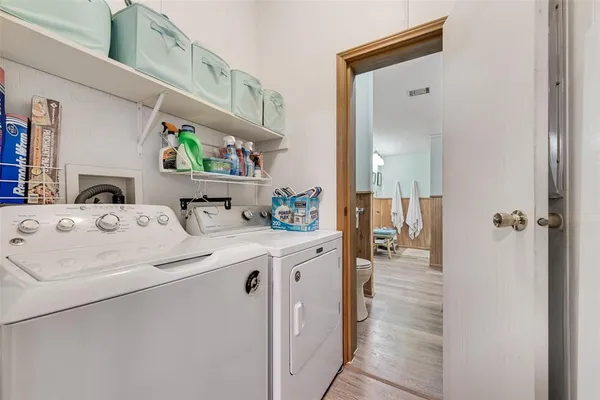 a en suite bathroom with a sink and a mirror