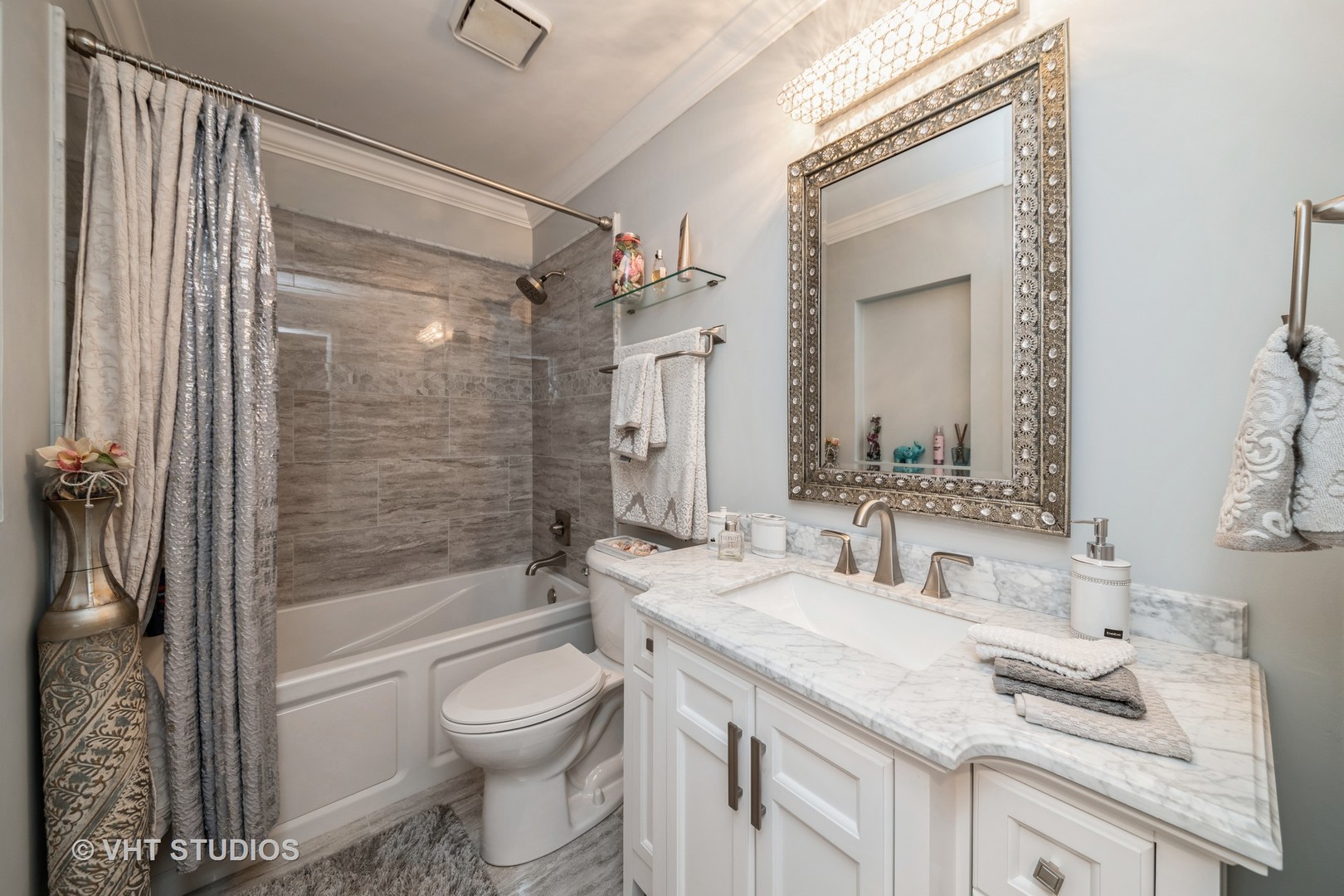 1026 Longford Road Bartlett, IL 60103 - Photo 14 of 24 a bathroom with a granite countertop sink toilet and shower