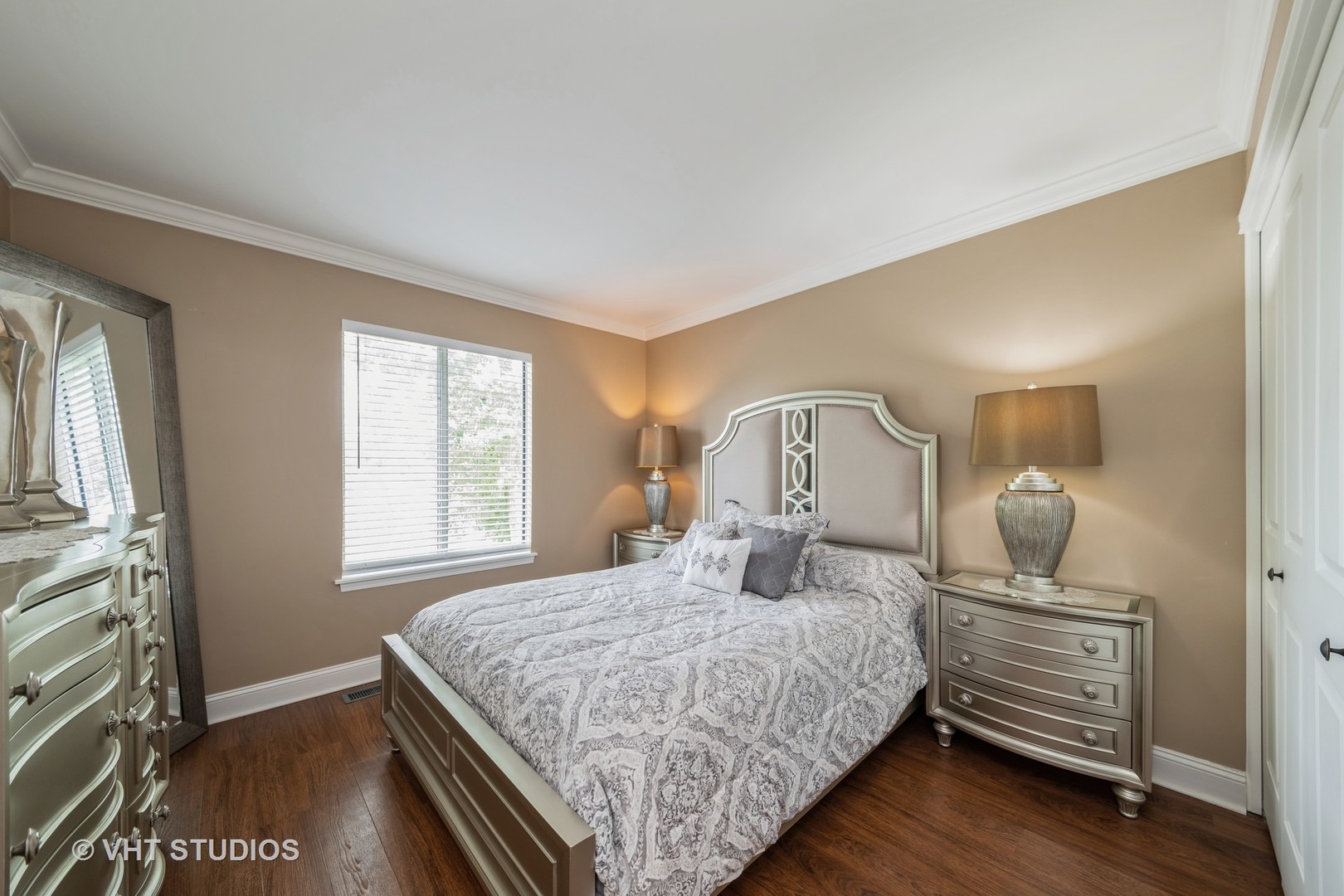 1026 Longford Road Bartlett, IL 60103 - Photo 18 of 24 a bedroom with a bed wooden floor and window