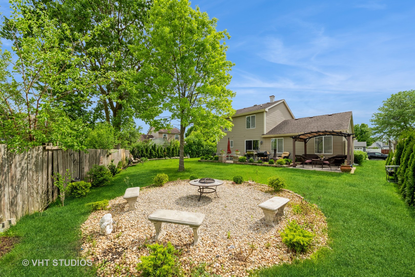 1026 Longford Road Bartlett, IL 60103 - Photo 19 of 24 a view of a house with a yard
