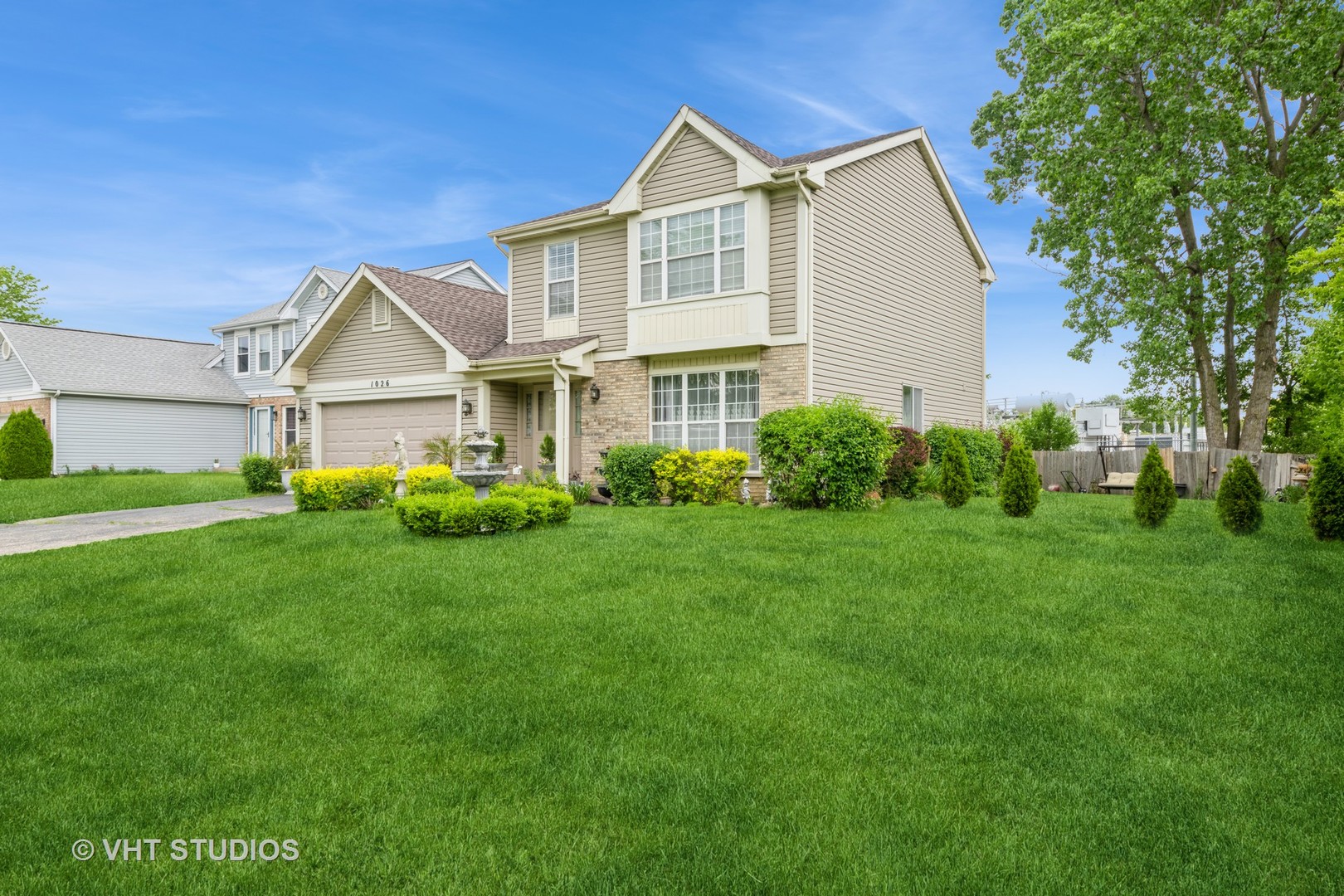 1026 Longford Road Bartlett, IL 60103 - Photo 24 of 24 a front view of a house with a yard