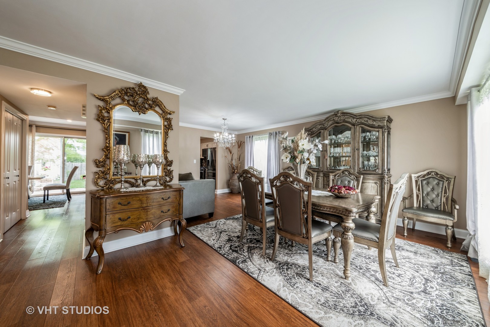 1026 Longford Road Bartlett, IL 60103 - Photo 3 of 24 a view of a livingroom with furniture and a table