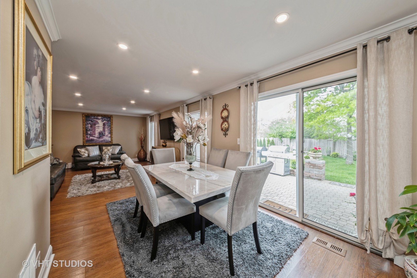 1026 Longford Road Bartlett, IL 60103 - Photo 10 of 24 a view of a dining room with furniture window and outside view