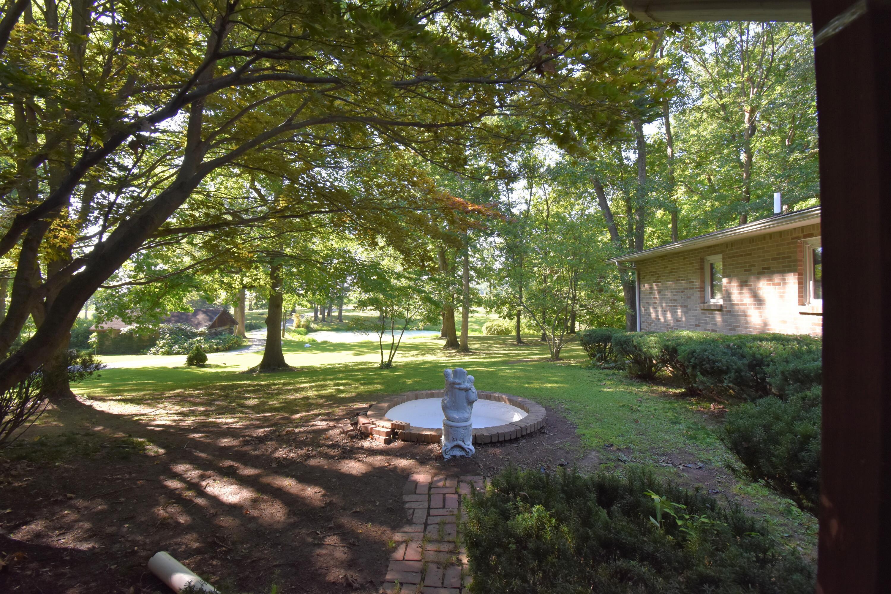 428 Coover Road Delaware, OH 43015 - Photo 34 of 41 View from Front Porch fountain