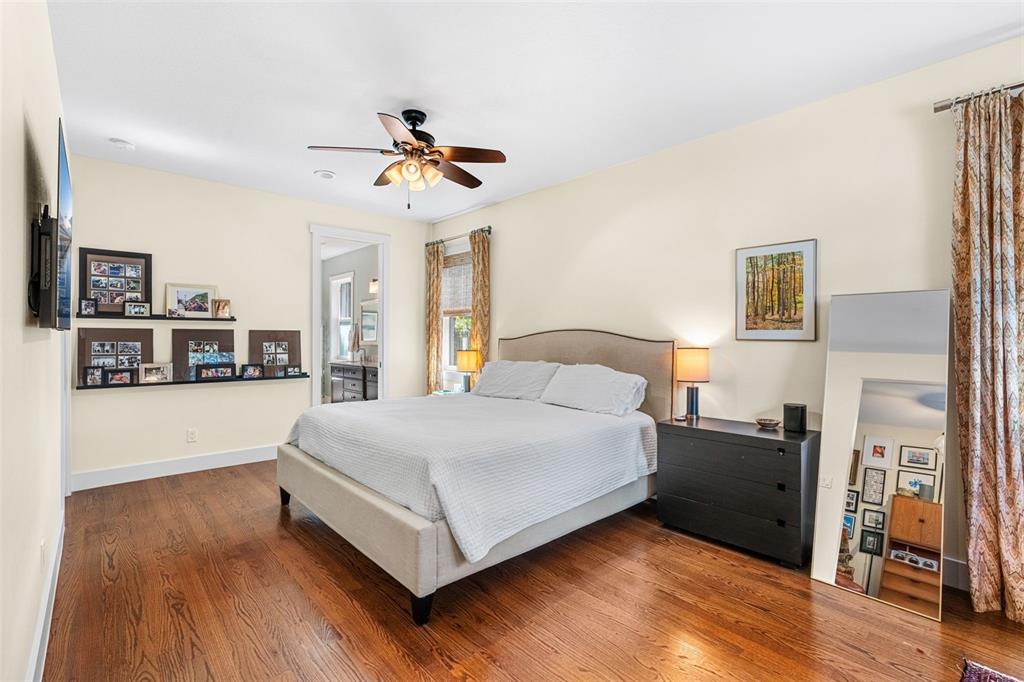 2501 Winter Park Road Winter Park, FL 32789 - Photo 22 of 63 a bedroom with a bed and wooden floor