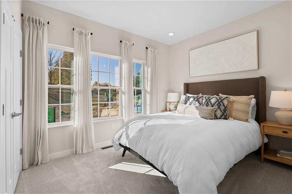 229 Lola Court McKees Rocks, PA 15136 - Photo 4 of 23 a bedroom with a bed and a window