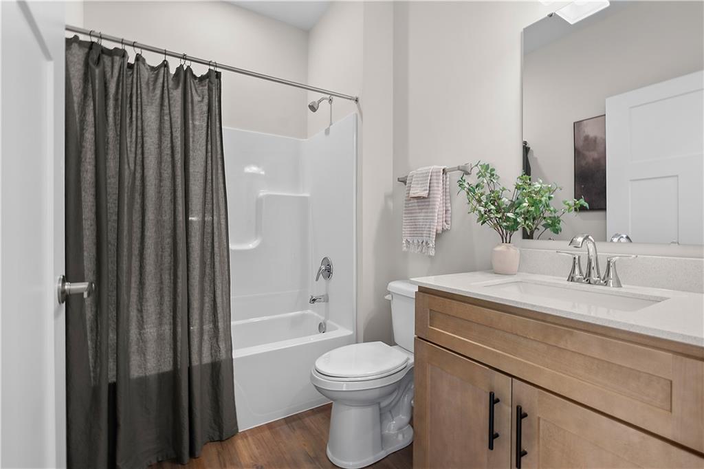 229 Lola Court McKees Rocks, PA 15136 - Photo 5 of 23 a bathroom with a sink a toilet and shower