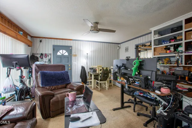 a room with furniture workspace and a window