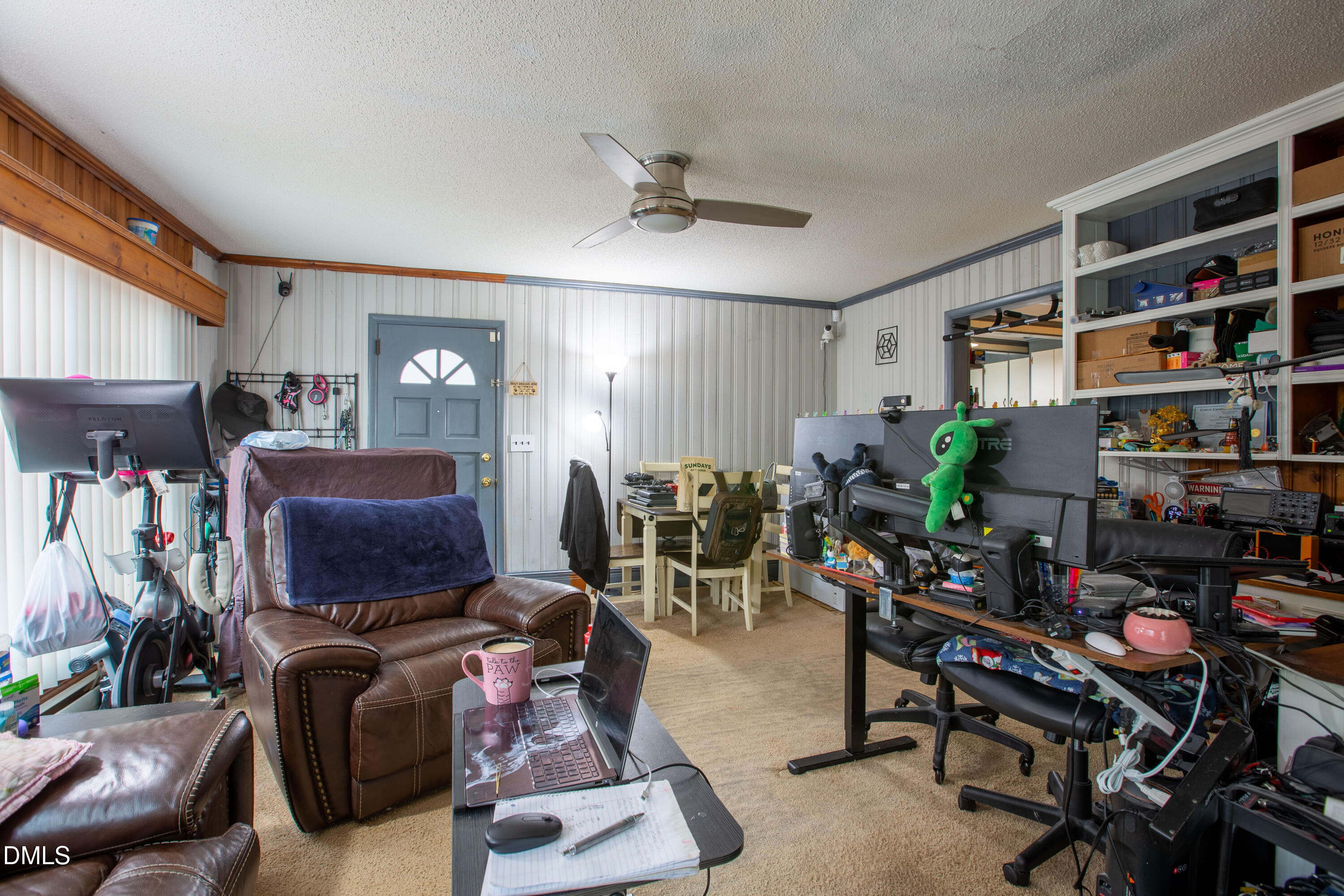 173 Jernigan Road Dunn, NC 28334 - Photo 12 of 42 a room with furniture workspace and a window