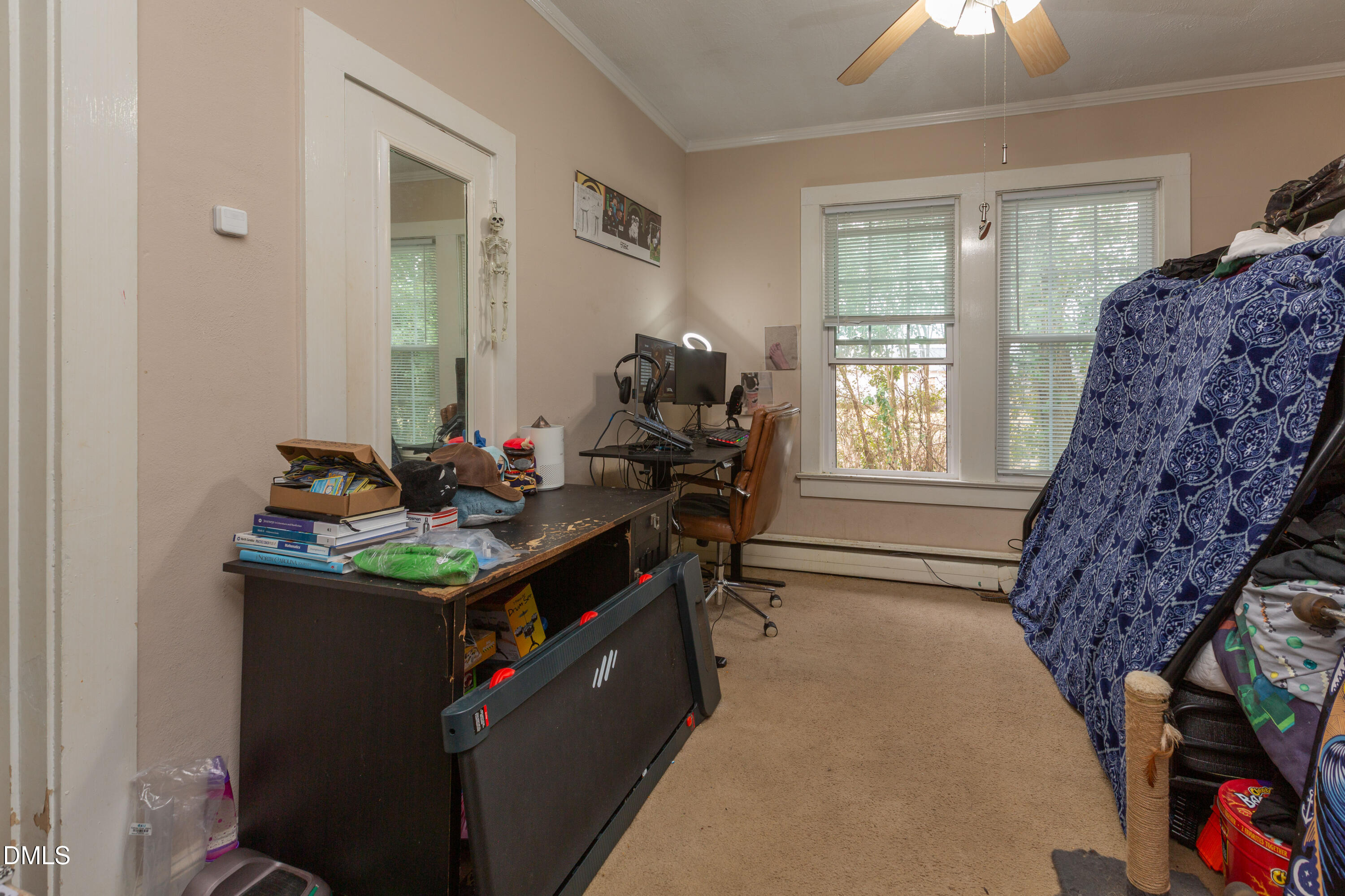 173 Jernigan Road Dunn, NC 28334 - Photo 24 of 42 a living room with furniture and a window