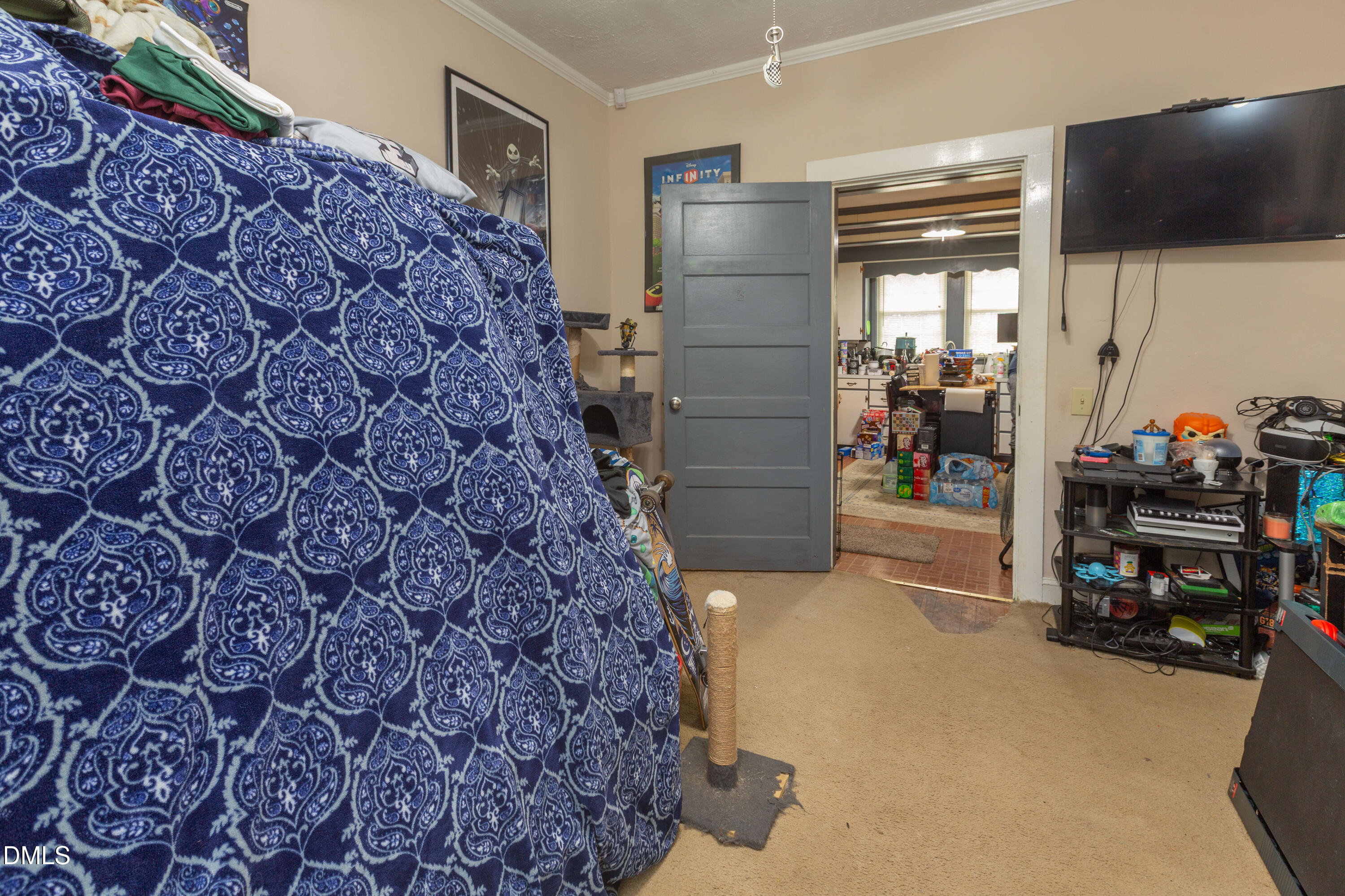 173 Jernigan Road Dunn, NC 28334 - Photo 25 of 42 a living room with furniture and a flat screen tv