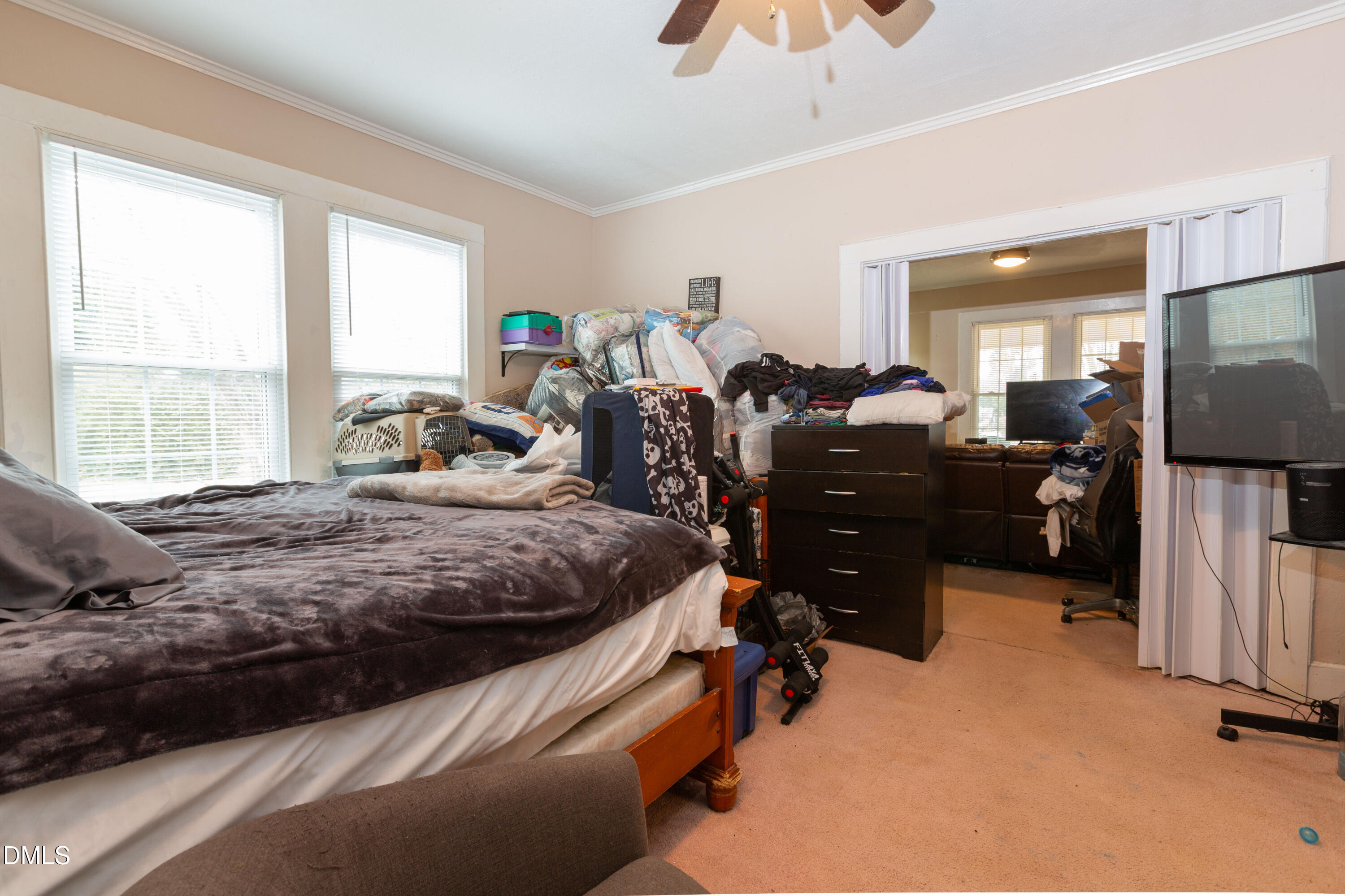 173 Jernigan Road Dunn, NC 28334 - Photo 26 of 42 a bed room with furniture and a window