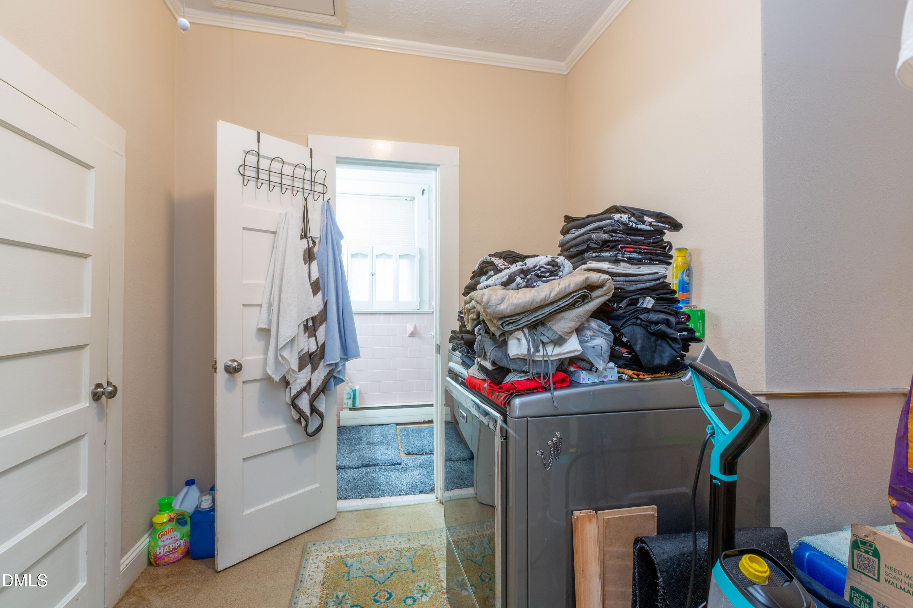 173 Jernigan Road Dunn, NC 28334 - Photo 29 of 42 a utility room with dryer and washer