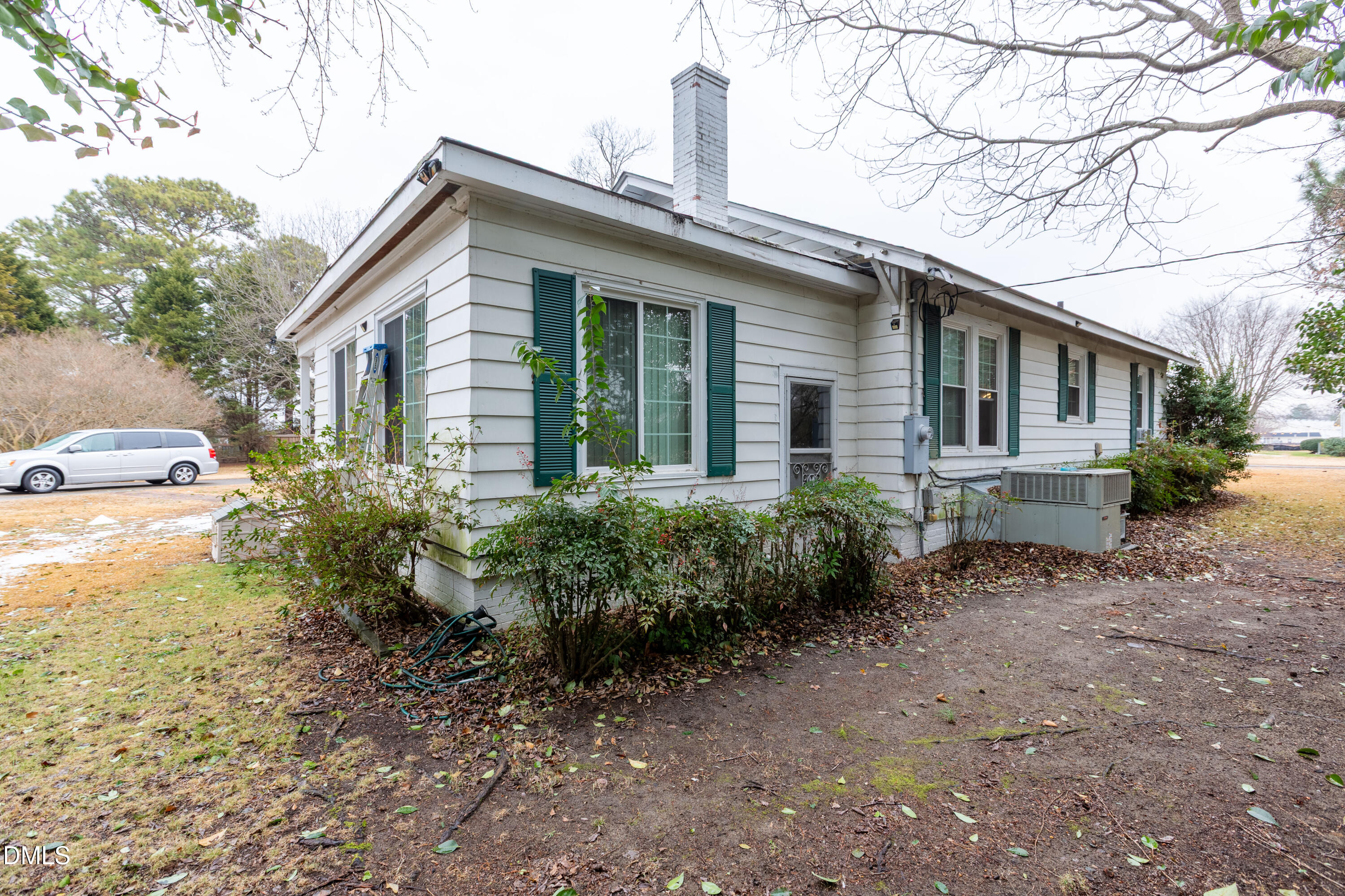 173 Jernigan Road Dunn, NC 28334 - Photo 37 of 42 a view of a house with a yard and plants