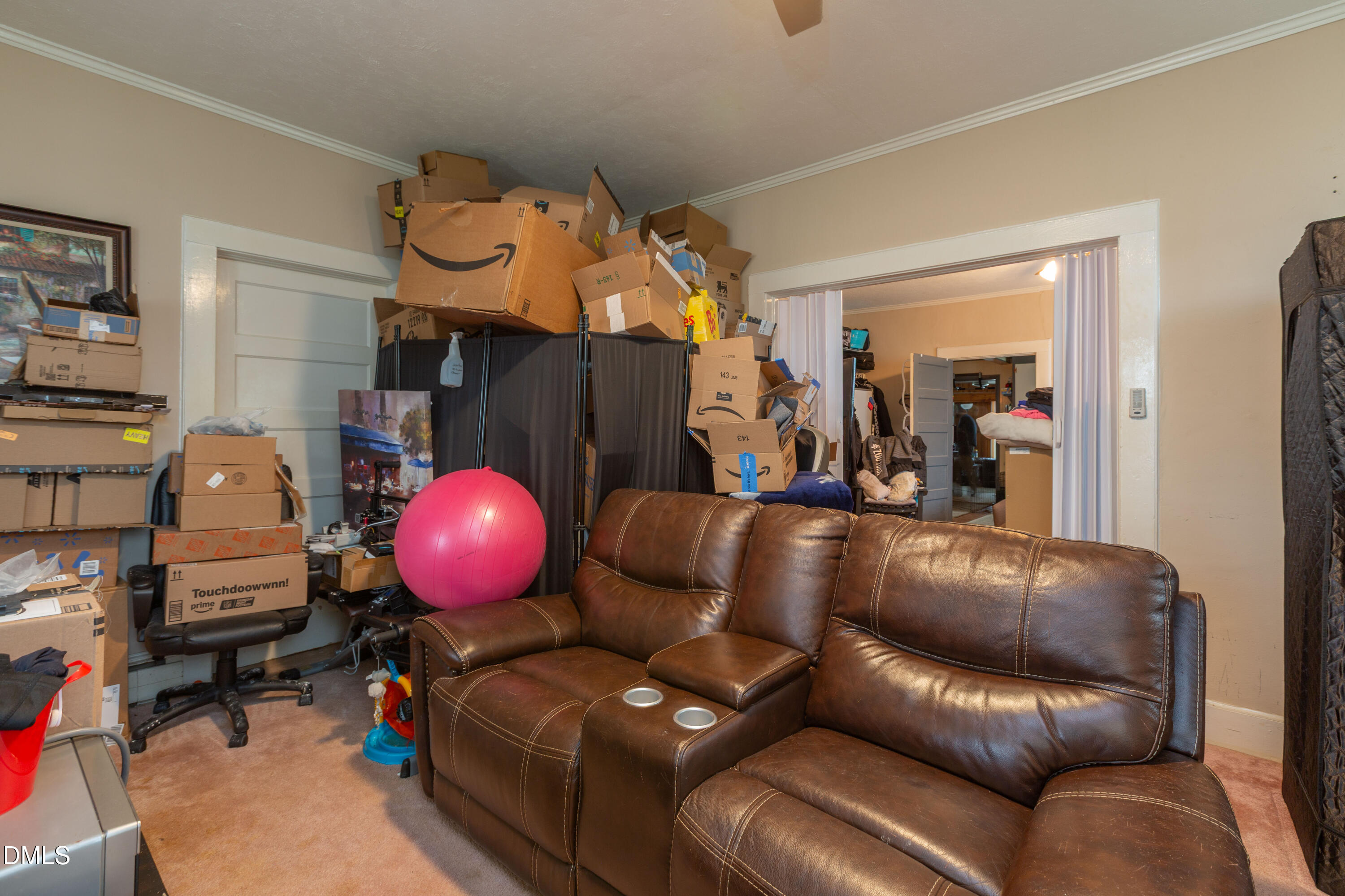 173 Jernigan Road Dunn, NC 28334 - Photo 40 of 42 a living room with furniture and a wooden floor