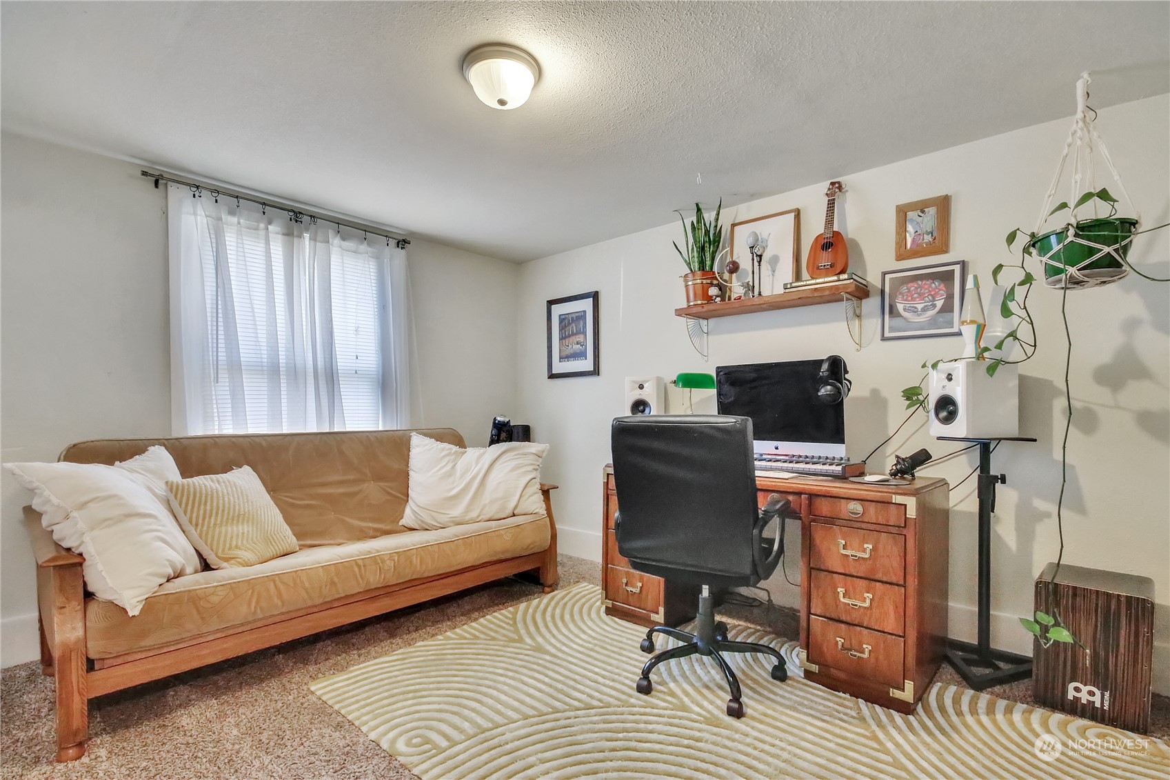 813 West Main Puyallup, WA 98371 - Photo 12 of 24 a living room with furniture and a couch
