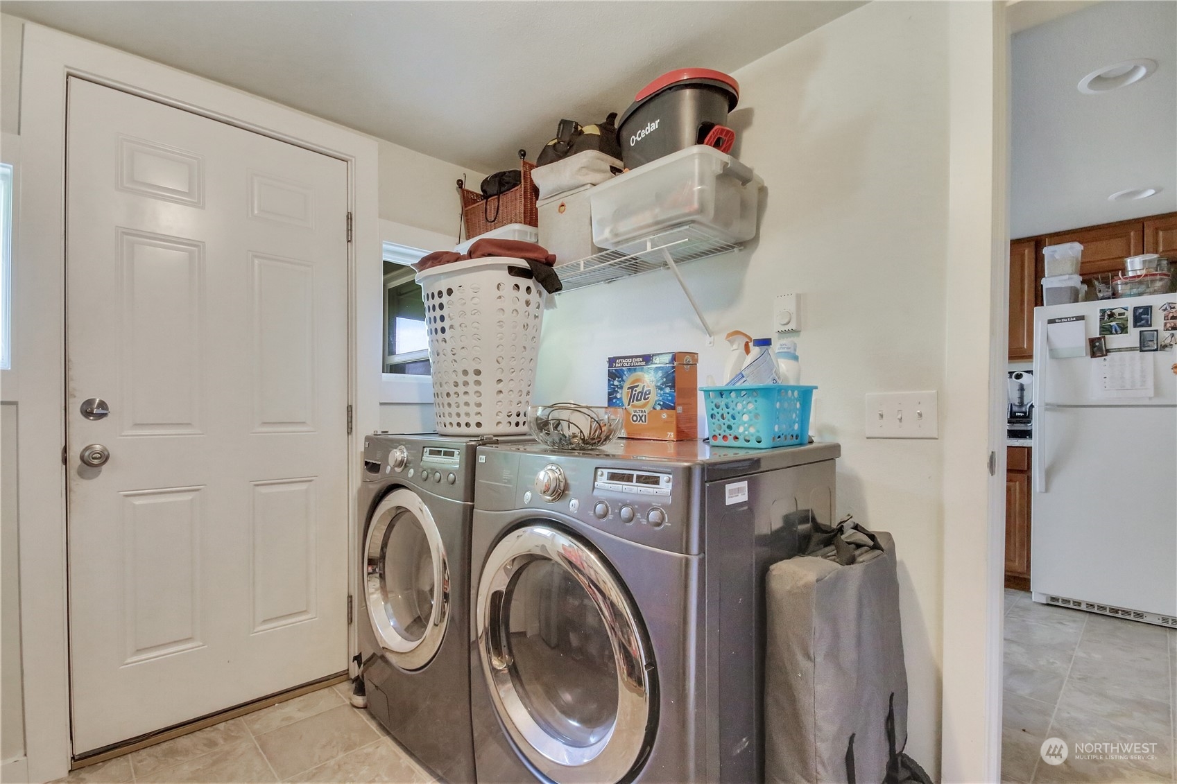 813 West Main Puyallup, WA 98371 - Photo 13 of 24 a view of storage and utility room with washer and dryer