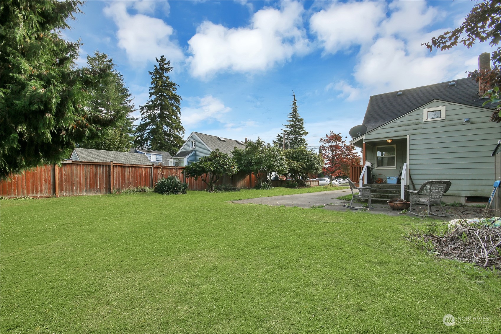 813 West Main Puyallup, WA 98371 - Photo 15 of 24 a view of a house with backyard and sitting area