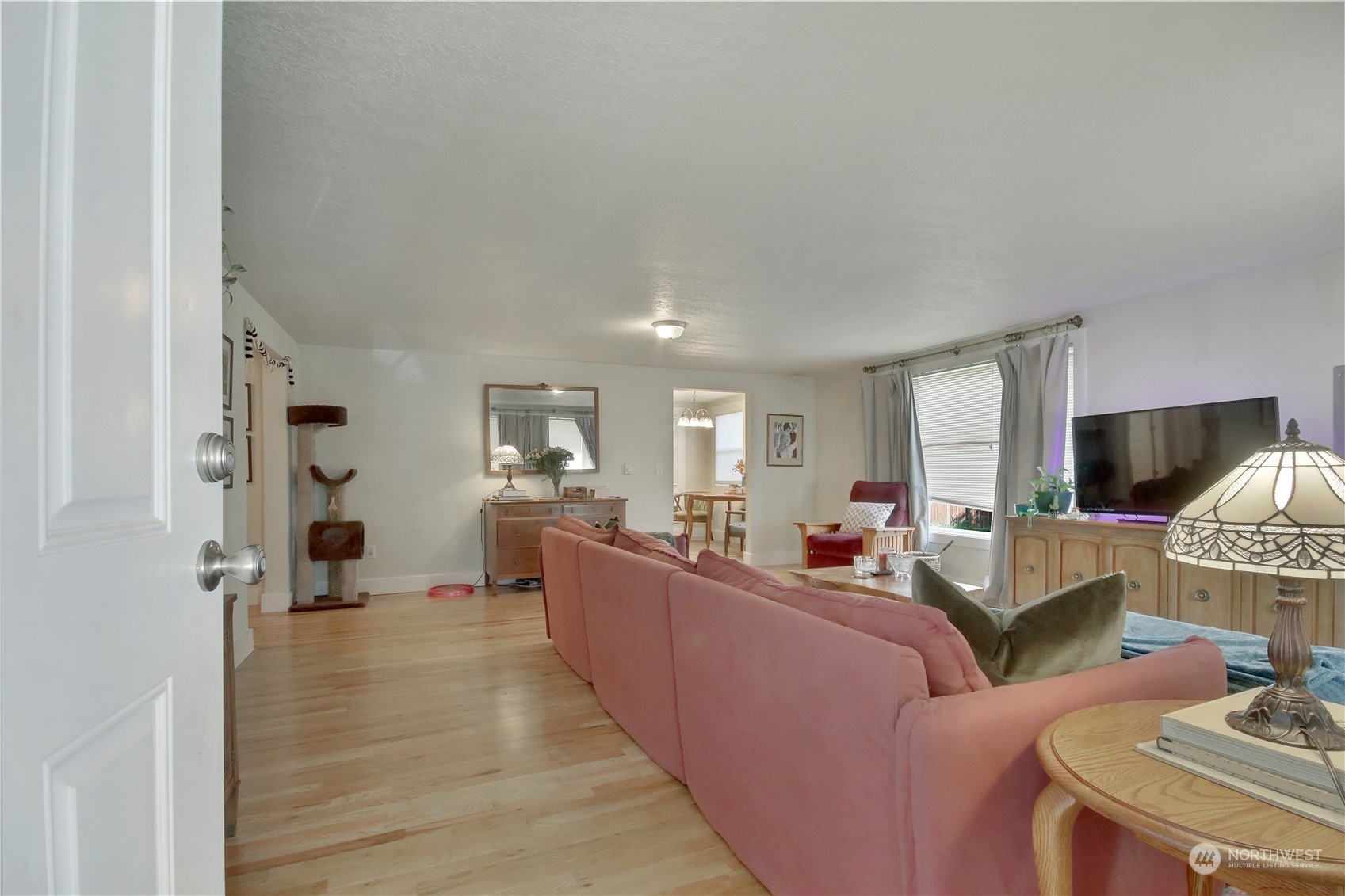 813 West Main Puyallup, WA 98371 - Photo 4 of 24 a living room with furniture and a wooden floor