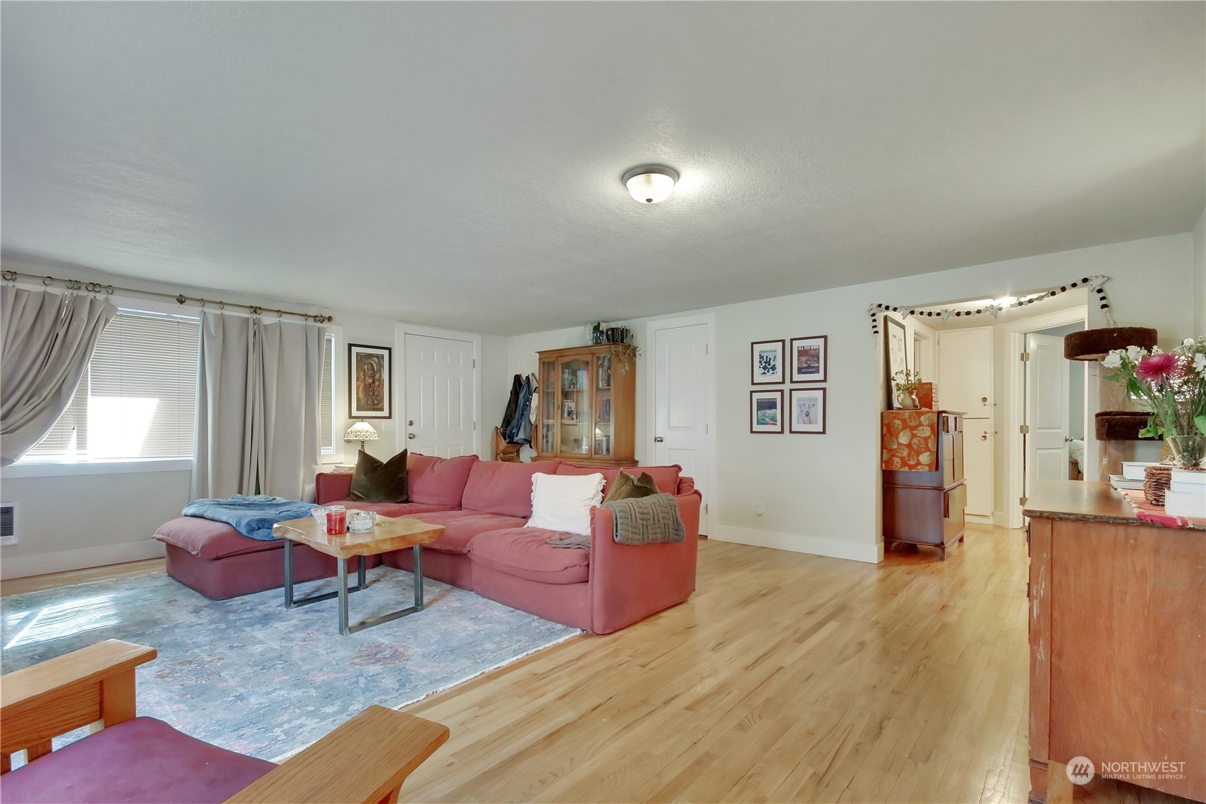 813 West Main Puyallup, WA 98371 - Photo 6 of 24 a living room with furniture and wooden floor