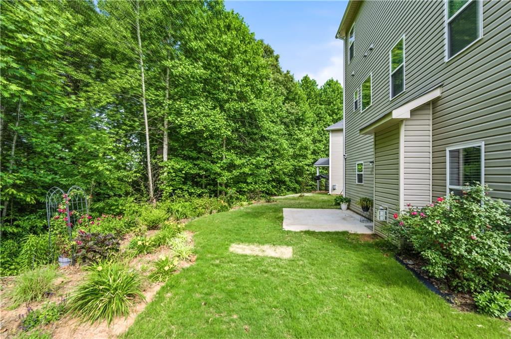 291 Boulder Run Hiram, GA 30141 - Photo 37 of 46 a view of a backyard with plants