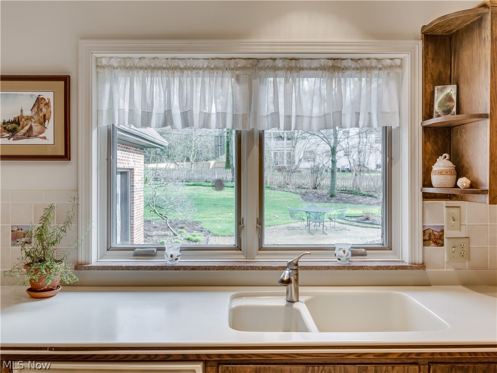2110 Ridgewood Road Akron, OH 44313 - Photo 16 of 35 Wonderful view of the backyard through the window above the kitchen sink!