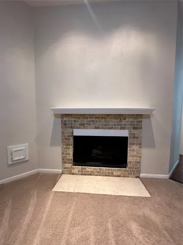 a living room with a fireplace