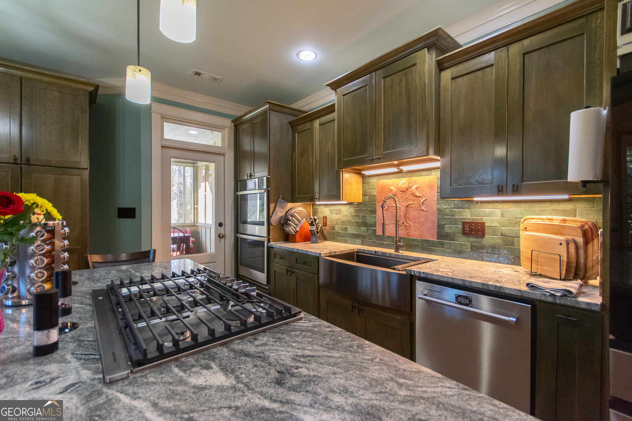 190 Carl Williams Road Senoia, GA 30276 - Photo 26 of 93 a kitchen with stainless steel appliances granite countertop a sink stove and refrigerator